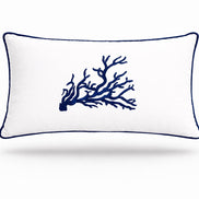 Navy coral embroidered across a white 35 x 55 cm outdoor cushion trimmed in navy piping