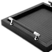 Close corner of the 36 x 36 cm tray, the woven-embossed leather carried over the mitred edge onto the outer wall