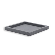 Grey tray, the 36 cm floor reading flat and even beneath a low woven rim
