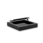 Black holder, the weighted bar resting across the open woven leather base