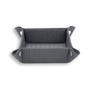 Grey piped tray, the coarse embossed plait on the walls set against a finer weave on the floor