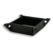 The 20 x 20 cm valet tray whole, all four leather corners drawn up and snapped to make a 6.5 cm well