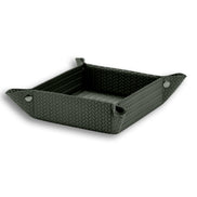 The 32 x 17.5 cm valet tray whole, all four leather corners snapped up around the woven floor