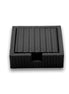 Six black 13 cm square coasters in their woven leather holder, a finger notch cut at the front