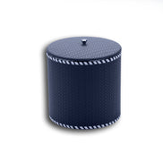 Navy leather cylinder, pale whipstitching running the full circumference of the 14 cm lid