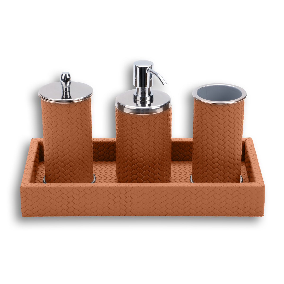 Warm tan set, the leather emboss matched across the tray and all three cylinders