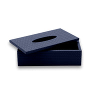 Navy leather tissue cover, its lid askew above the box, the weave running the same way on both