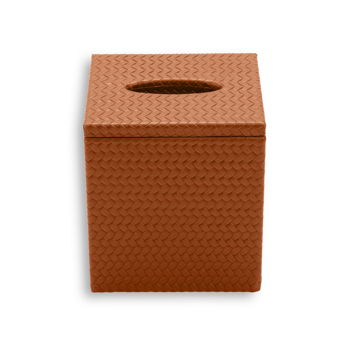 Terracotta tan cover, the leather weave catching light along the lid overhang