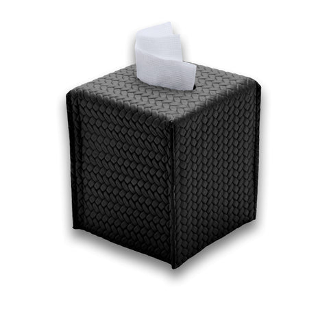 Black 11.5 × 11.5 cm tissue cover upright, a tissue drawn through the slot in its woven-embossed leather lid