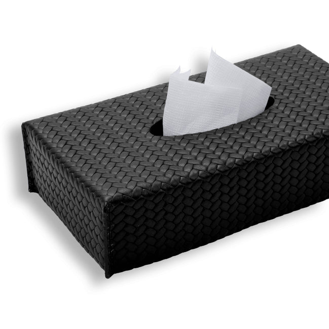 Black slim tissue cover 24 × 13 cm, a tissue drawn up through the slot in its honeycomb-embossed lid
