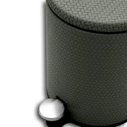 Grey woven leather waste bin, brushed steel pedal at the foot of the 18 cm wide body