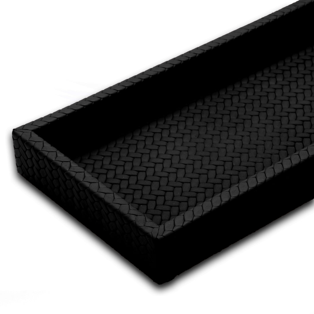 Low corner view into the 30 x 15 cm tray, the leather weave running on the diagonal across the floor inside the rim