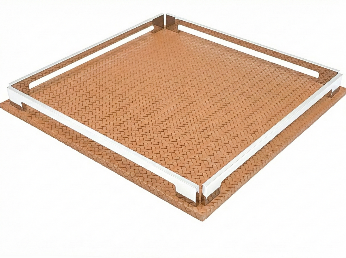 Tan 37 × 37 cm tray, warm orange-brown leather weave framed by polished steel rails