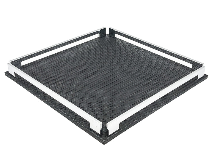 Black 37 × 37 cm square tray from above left, two full-length steel rails framing the woven-embossed leather floor