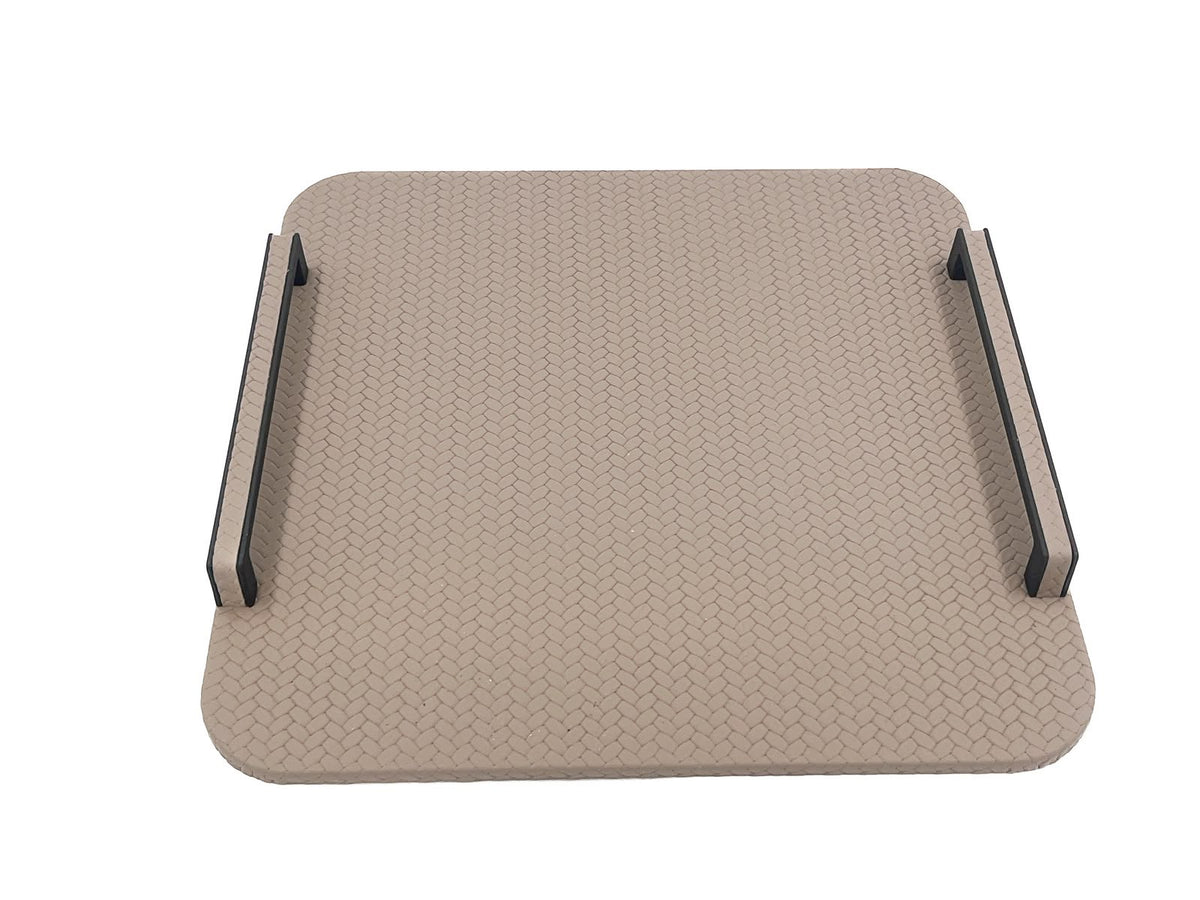 The 42 x 30 cm tray seen level, both rails standing clear of a surface embossed in tight interlocking links