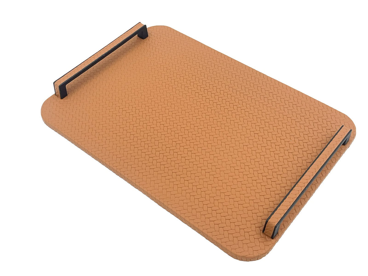 Caramel tan panel, black steel handles standing on blocks above the 1 cm leather board
