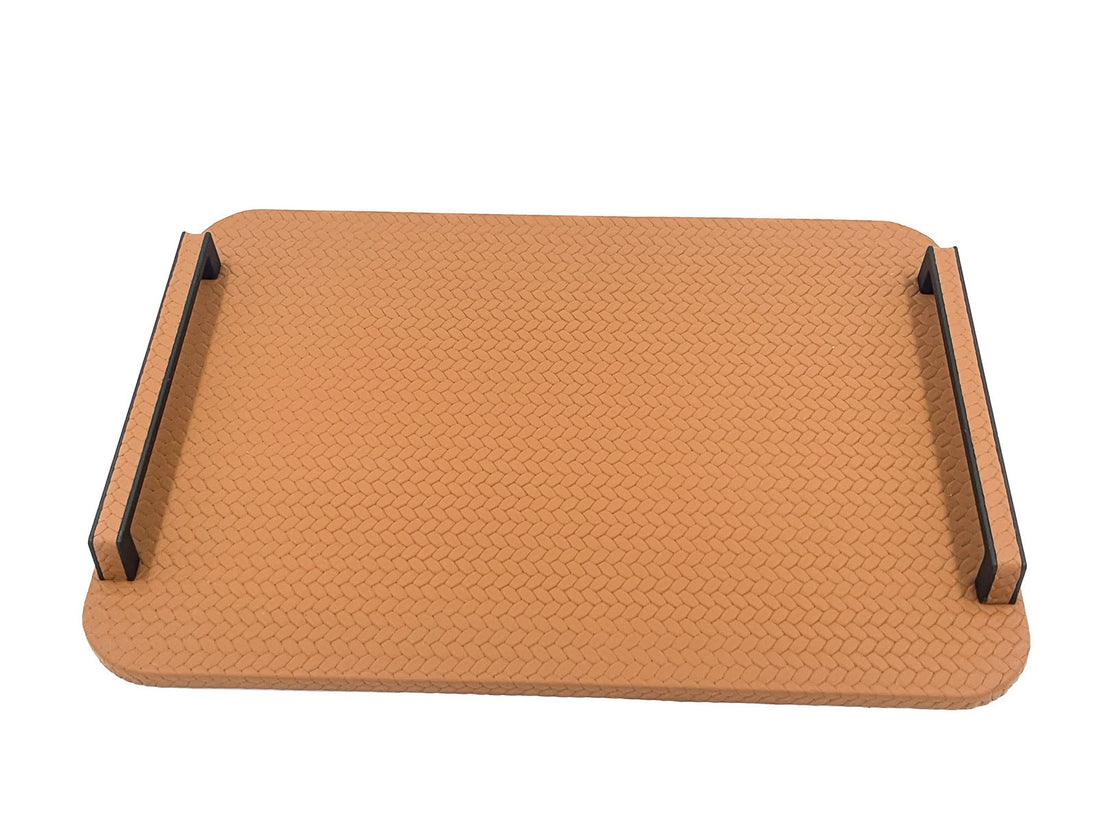 The 36.5 cm square panel seen low from the front, a coarse chevron plait embossed across the leather between two black metal carrying rails