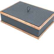 Slate-grey 32 × 23 cm box closed, walnut rails top and bottom around honeycomb-embossed leather