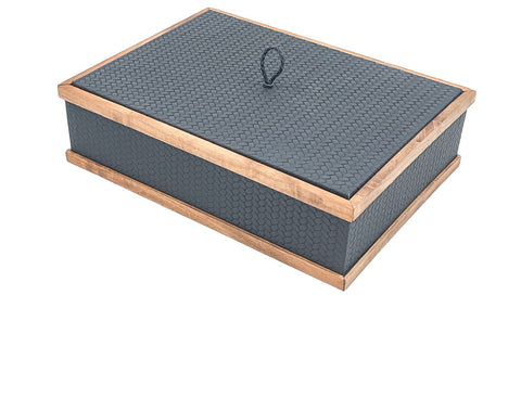 Slate-grey 32 × 23 cm box closed, walnut rails top and bottom around honeycomb-embossed leather