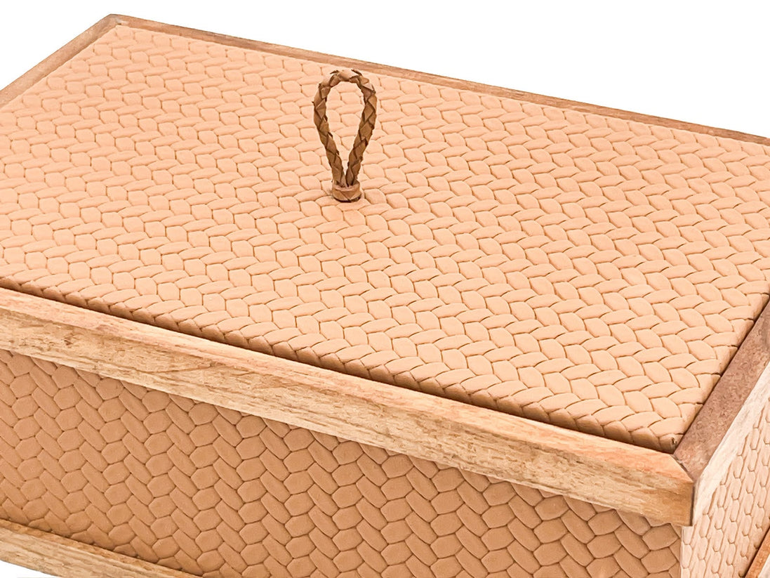 The same 27 x 19 cm box in a paler leather, the lid set flush inside its walnut rail with the mitred corner at right