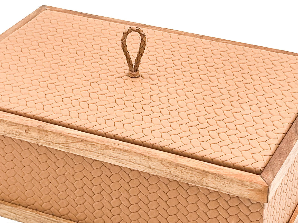 The same 27 x 19 cm box in a paler leather, the lid set flush inside its walnut rail with the mitred corner at right