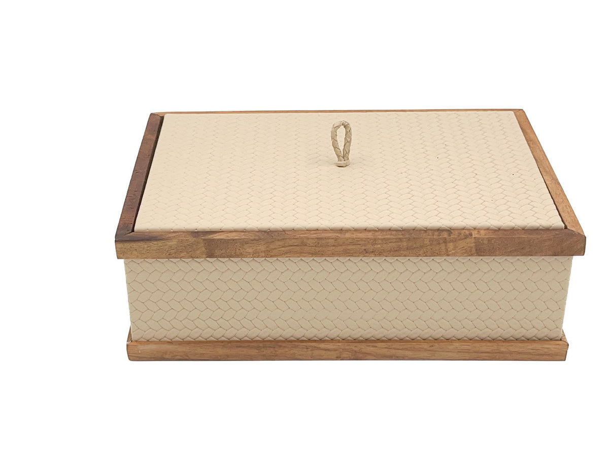 The rectangular 27 x 19 cm box shut, its scalloped leather panels set between walnut rails