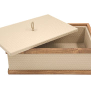 The lid tipped off the 27 x 19 cm box, its plaited loop upright above a walnut-railed opening lined in leather