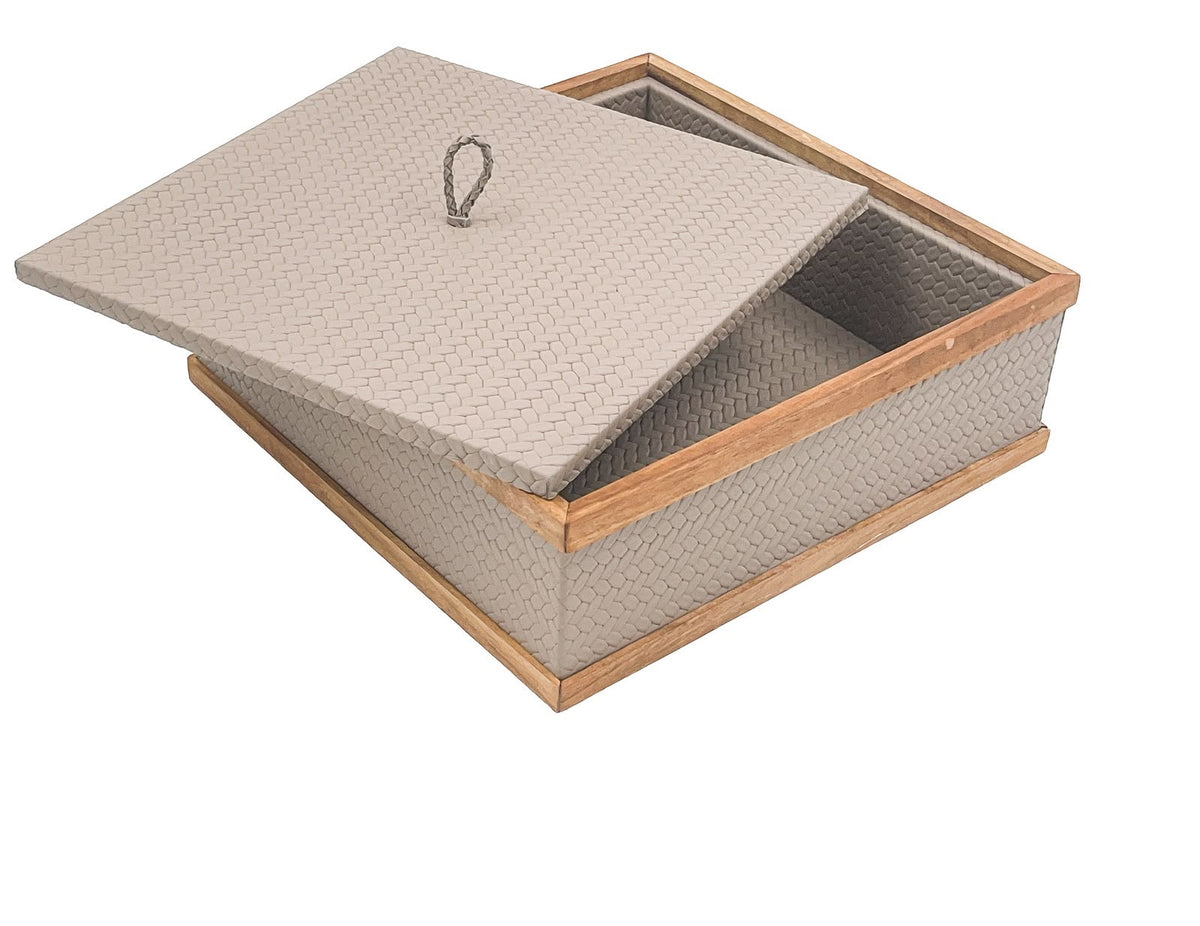 The lid lifted clear and propped across the open box, the walnut rail framing a leather-lined 7 cm well