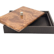 Dark brown box with the burl lid tipped open, showing the woven leather lining of the 5.5 cm well