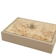 The small box closed, its burl wood lid seated inside a leather rim over a body 5.5 cm deep