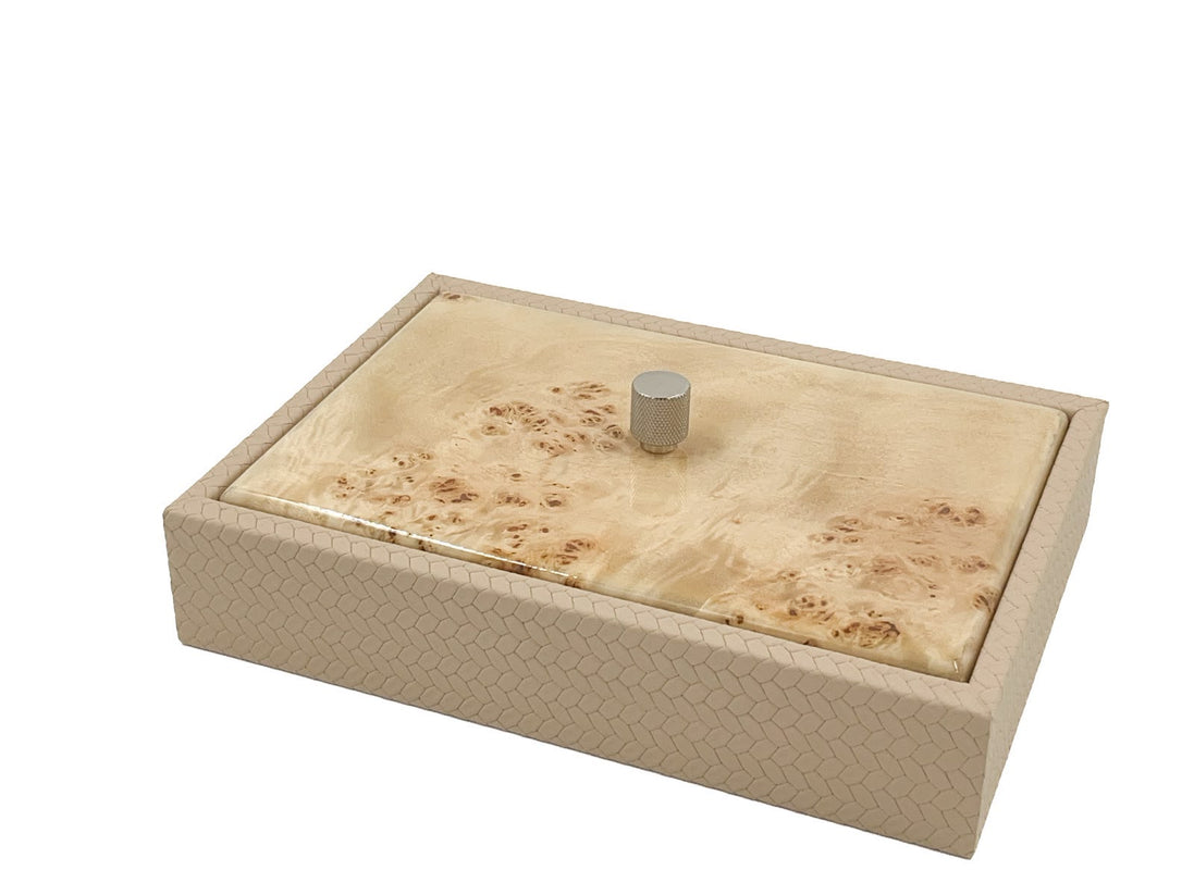 The small box closed, its burl wood lid seated inside a leather rim over a body 5.5 cm deep