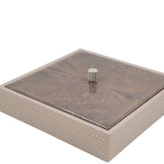 Pale greige 27 × 27 cm box shut, a dark burl-figured lid inside its woven leather rim