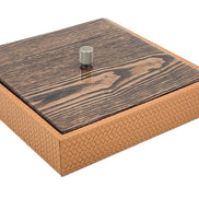 Tan box closed under a grey-figured wood lid, 5.5 cm of woven leather below it