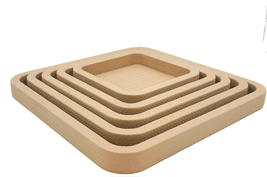 Five pale sand trays nested from above left, each 3.5 cm wall stepping in toward the 22 cm centre