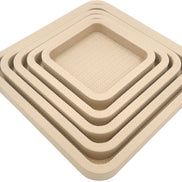 The set turned on the diagonal, five leather rims tapering inward from the 42 cm outer tray