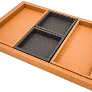 The set seen along its length, the base tray's woven rim standing proud around two black and two tan inner trays
