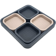 The modular tray angled corner forward, four leather wells stepping up from the 37 cm base