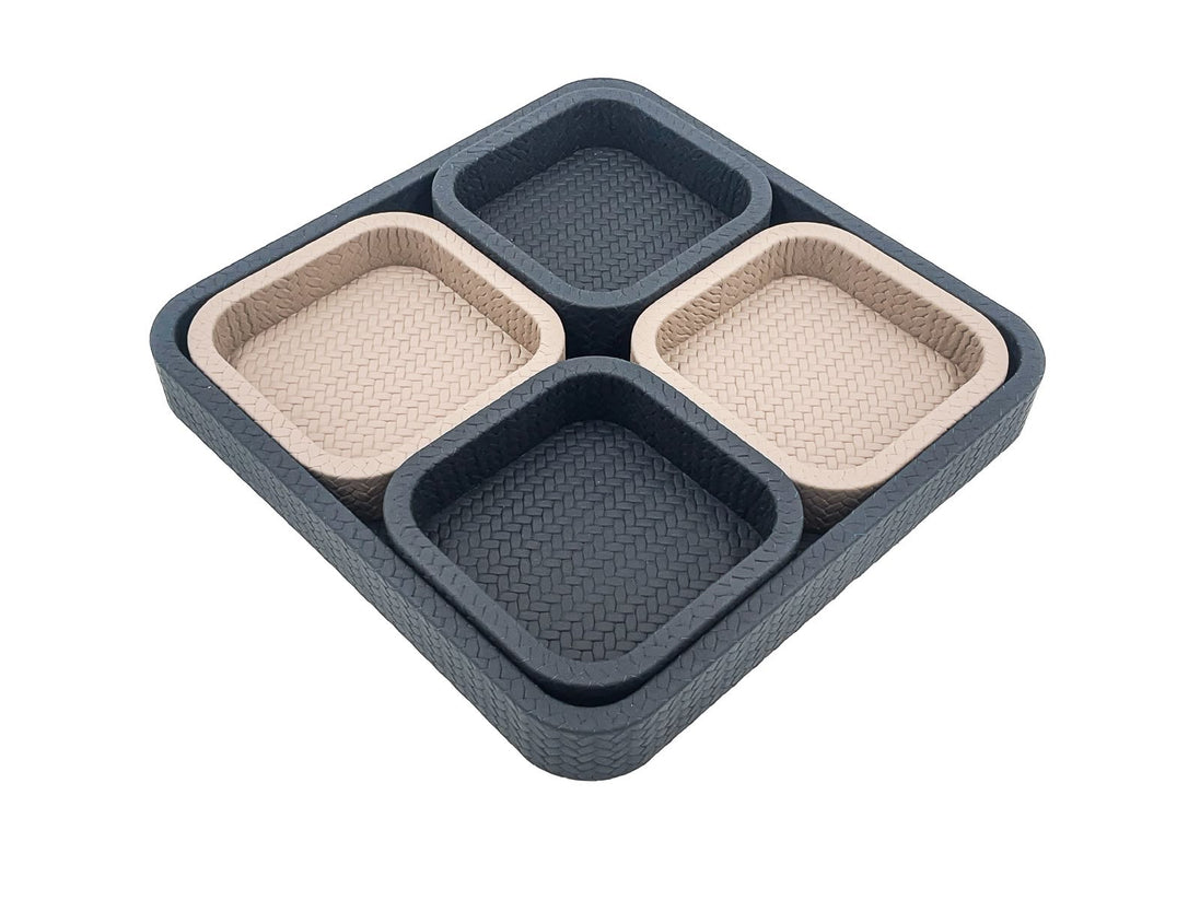 The modular tray angled corner forward, four leather wells stepping up from the 37 cm base