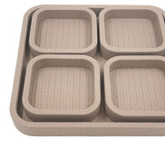 The modular set square on, four leather compartments filling the 37 cm base tray corner to corner