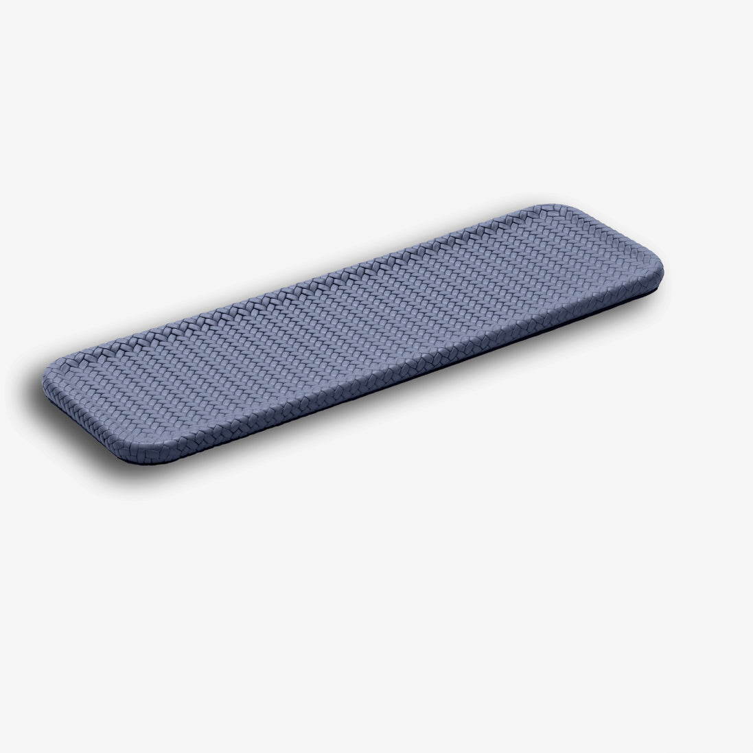 Navy tray angled across the frame, the 1 cm panel edge dark beneath the weave