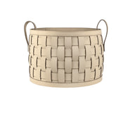 The 36 cm round basket seen whole, wide leather straps woven between stitched bands with a slim rolled handle at each side