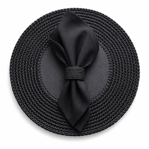 Black 36 cm placemat seen from above, a black napkin held in a braided cord ring on the leather centre