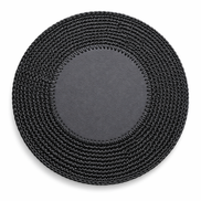 The 36 cm round placemat in black, its leather centre disc whipstitched into a crocheted cord border