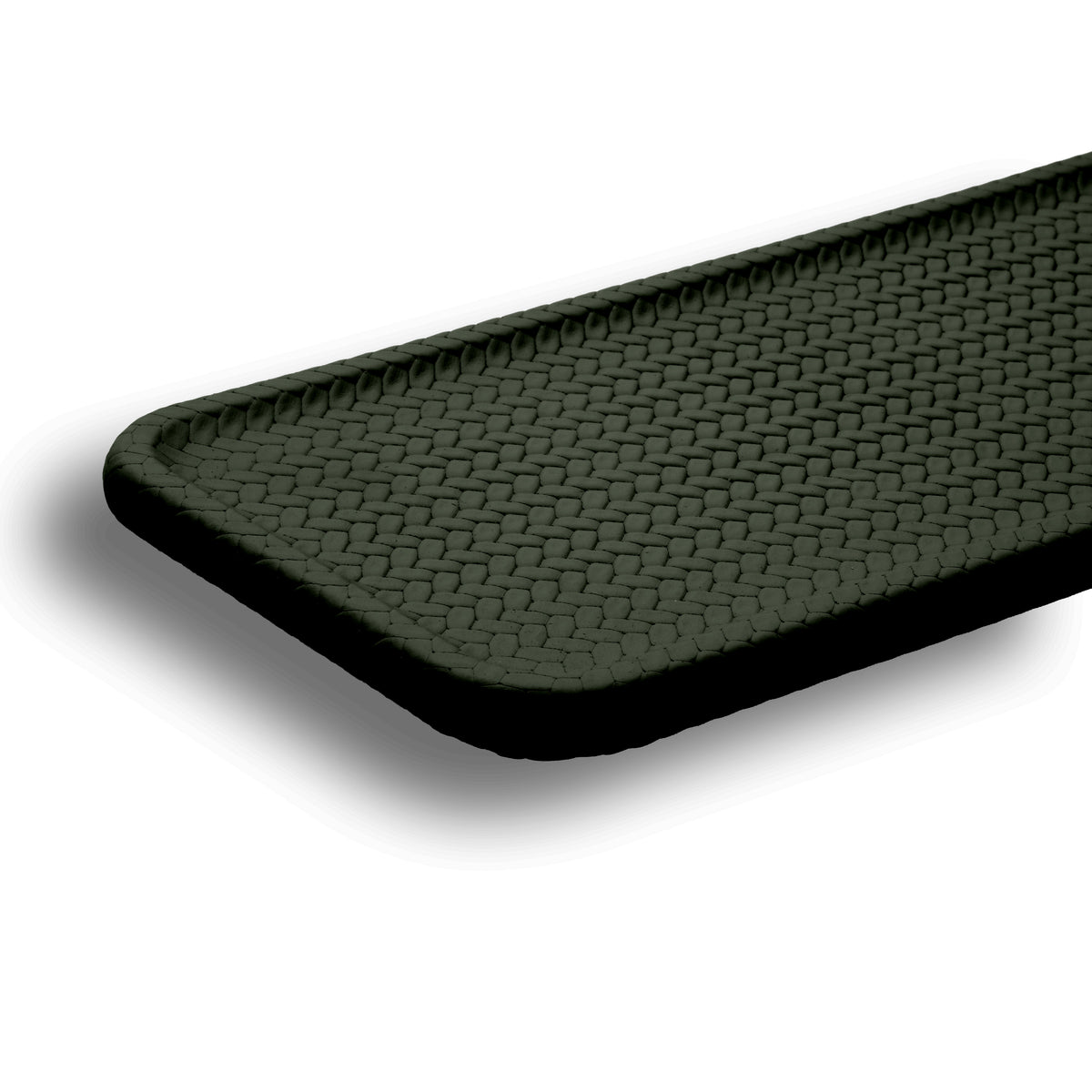 Khaki placemat at an angle, showing the plaited border that runs the edge and the full 1 cm thickness