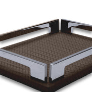 Near corner of the brown tray, two polished steel brackets braced against the 1 cm leather base