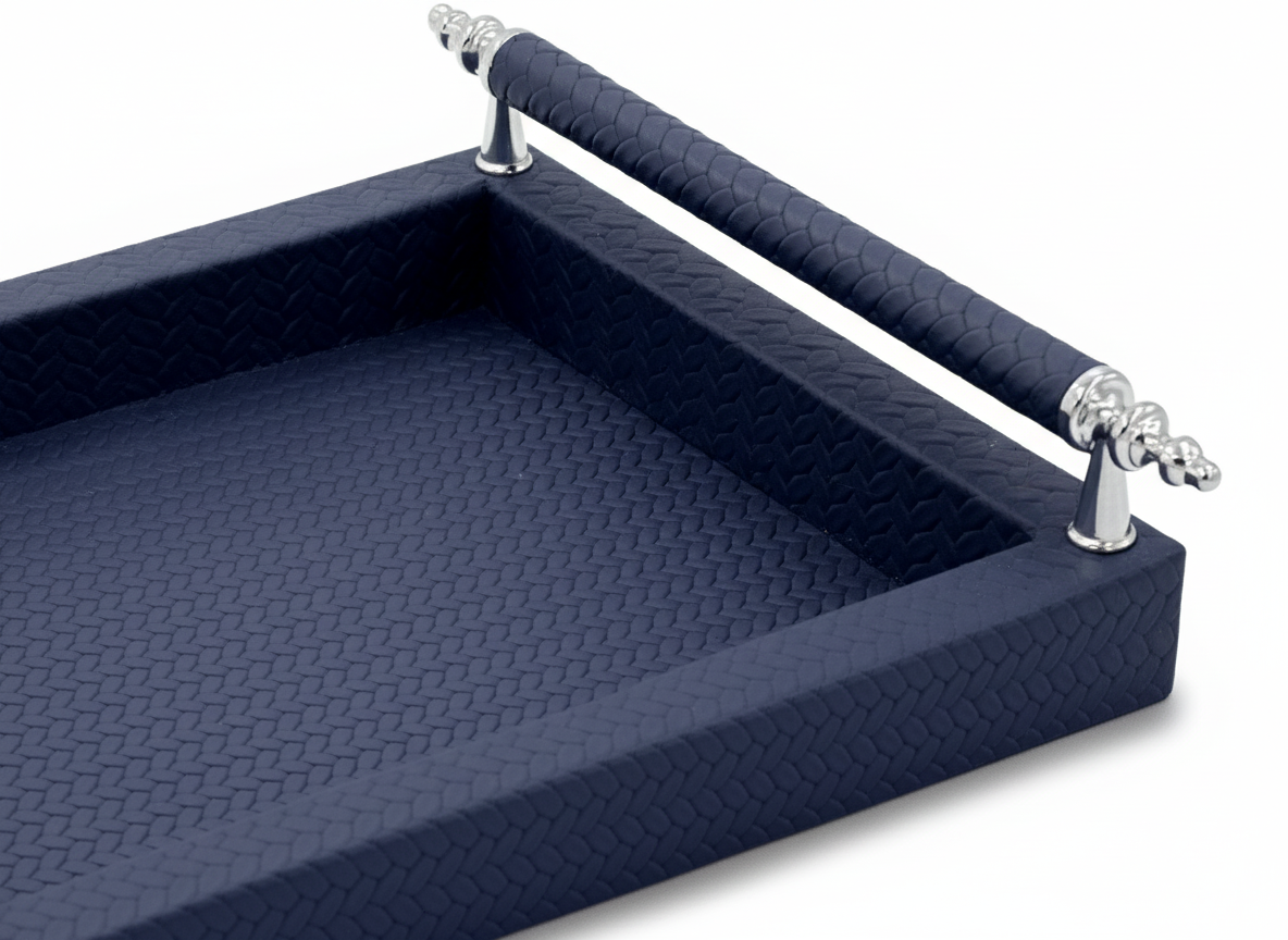 Beige 31 × 21 cm serving tray with its leather-wrapped rails on polished steel posts