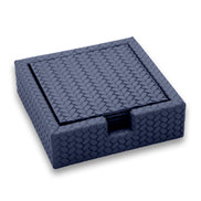 The navy 13 cm coaster holder from above left, six discs seated beneath the top coaster