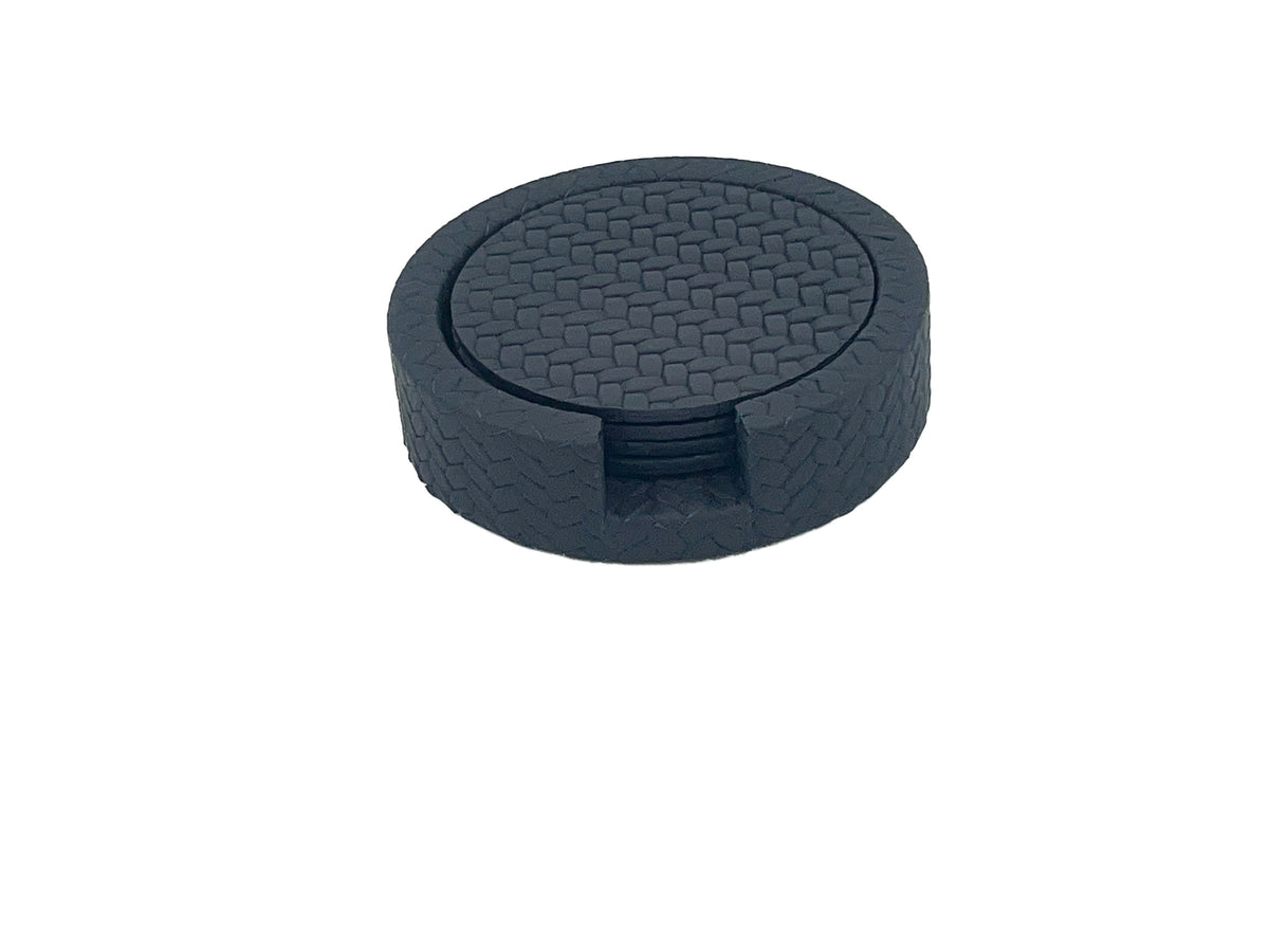 The navy coaster holder from a higher angle, the top Ø 10 cm disc seated flush inside