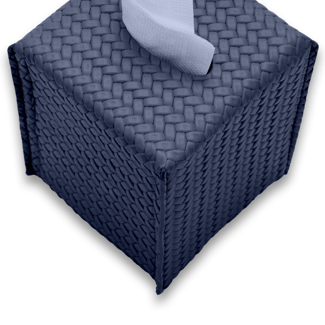 Close from above on the navy tissue cover, woven-embossed leather across the top face and two sides