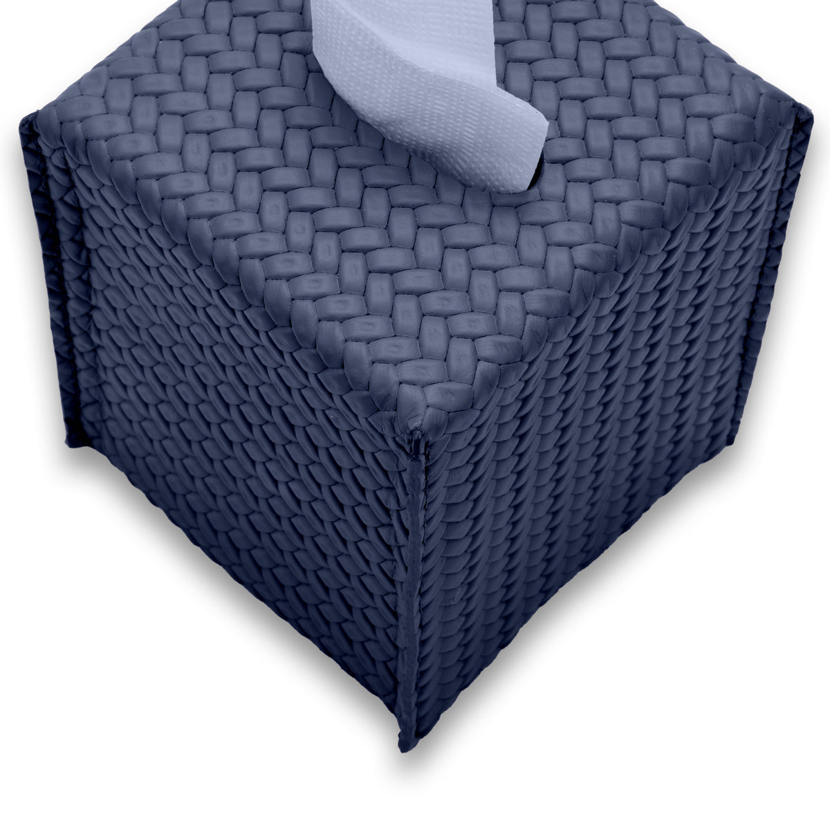 Close from above on the navy tissue cover, woven-embossed leather across the top face and two sides